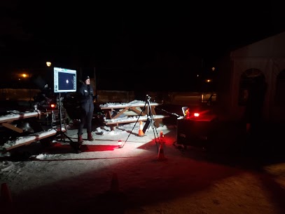 a fire truck parked in a dark room